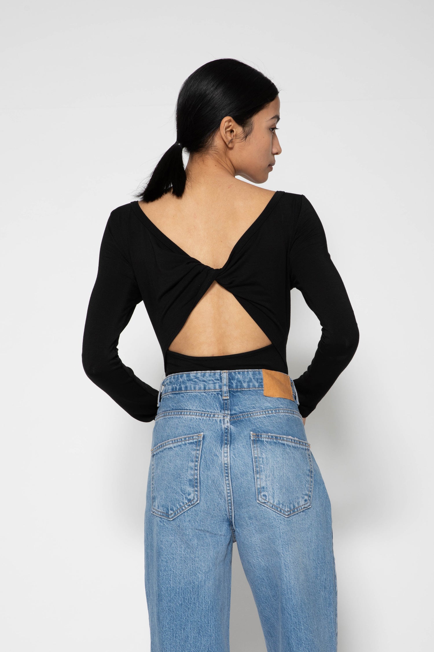 Collagen Twisted Back Bodysuit – determ;